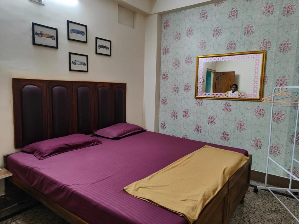 Postel nebo postele na pokoji v ubytování Hotel HCB (Hemo Chandra Bhawan)