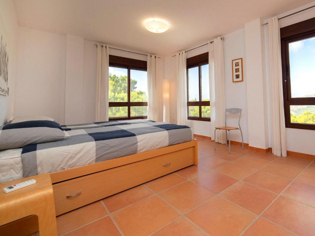 Postel nebo postele na pokoji v ubytování Villa Mucho by Interhome