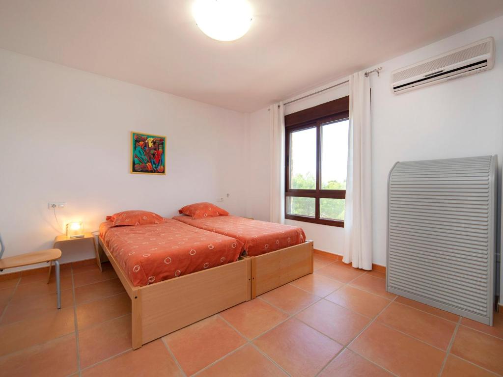 Postel nebo postele na pokoji v ubytování Villa Mucho by Interhome