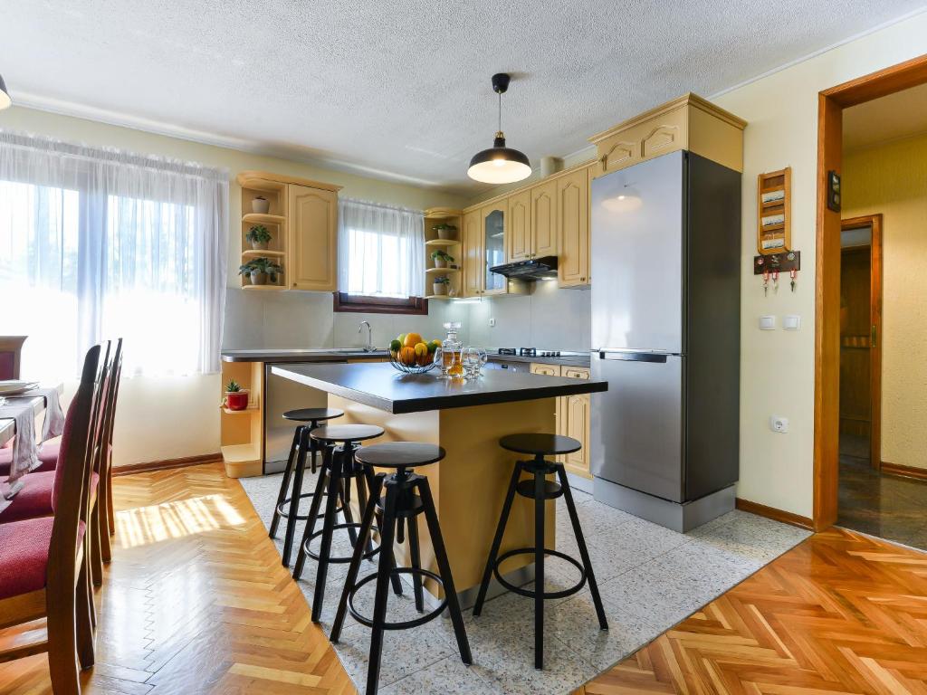 Kuchyň nebo kuchyňský kout v ubytování Holiday Home Otavia by Interhome