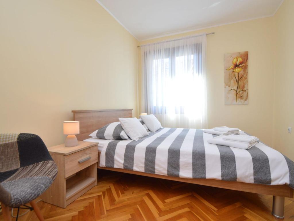 Postel nebo postele na pokoji v ubytování Holiday Home Otavia by Interhome