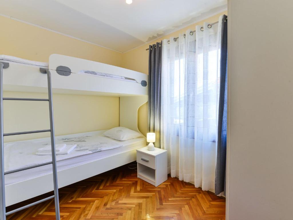 Postel nebo postele na pokoji v ubytování Holiday Home Otavia by Interhome