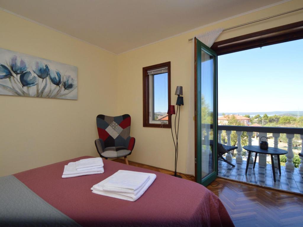Postel nebo postele na pokoji v ubytování Holiday Home Otavia by Interhome