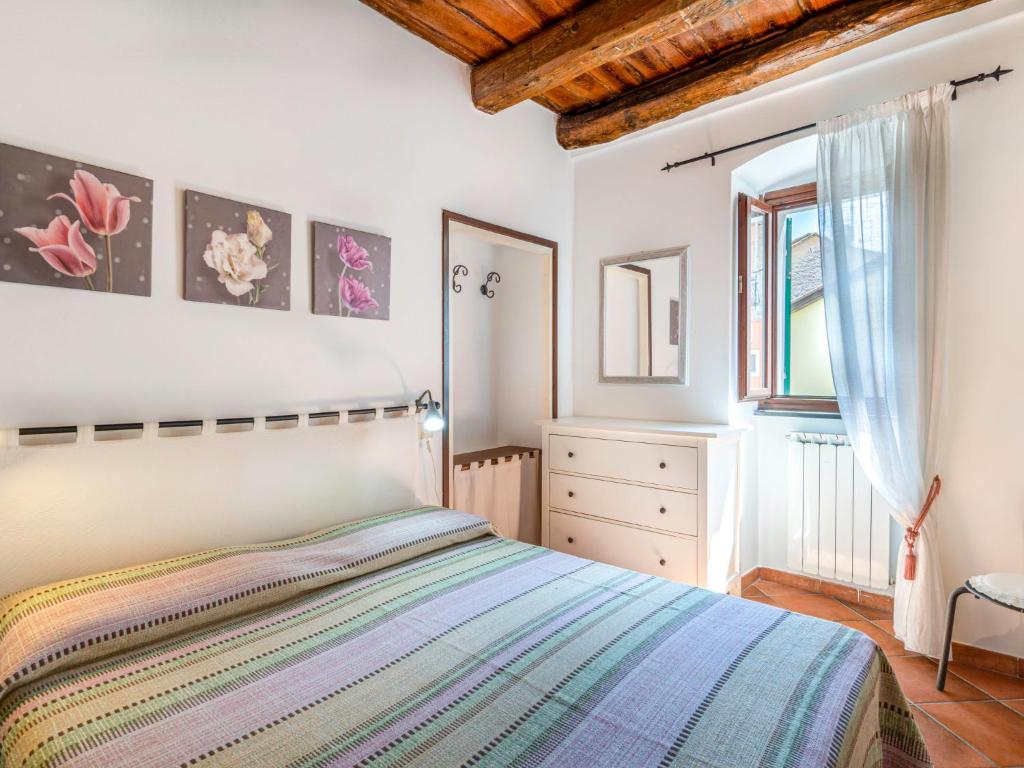 Posteľ alebo postele v izbe v ubytovaní Apartment Ca du Ponte by Interhome