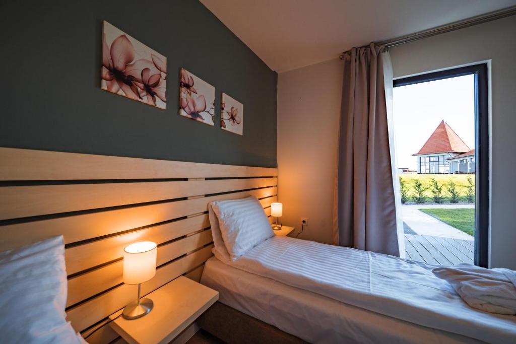 Postel nebo postele na pokoji v ubytování TERMAL KRE-SPA
