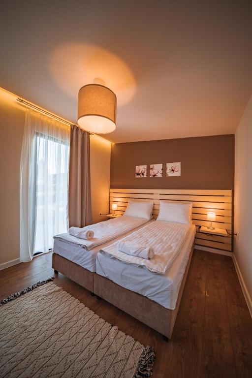 Postel nebo postele na pokoji v ubytování TERMAL KRE-SPA
