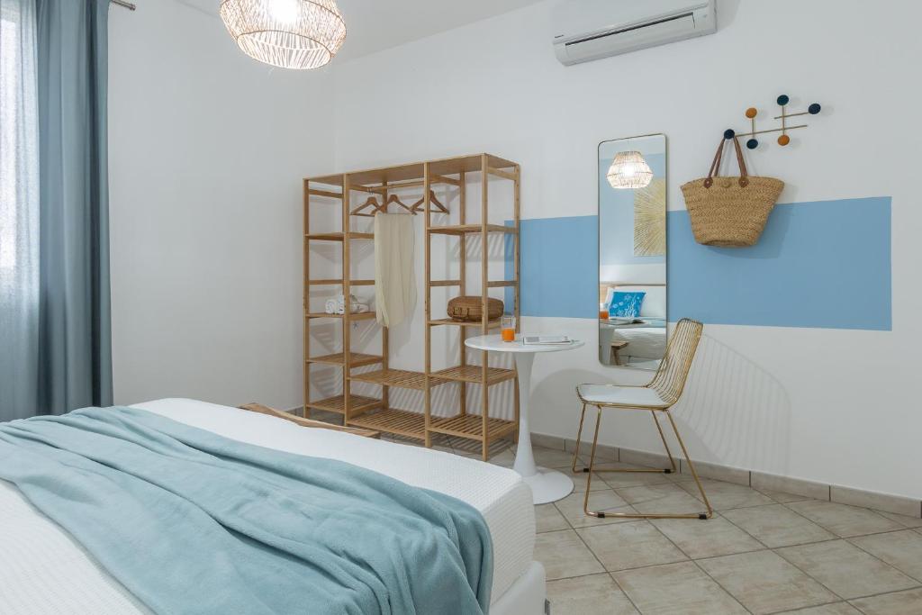 Łóżko lub łóżka w pokoju w obiekcie Villa Palma