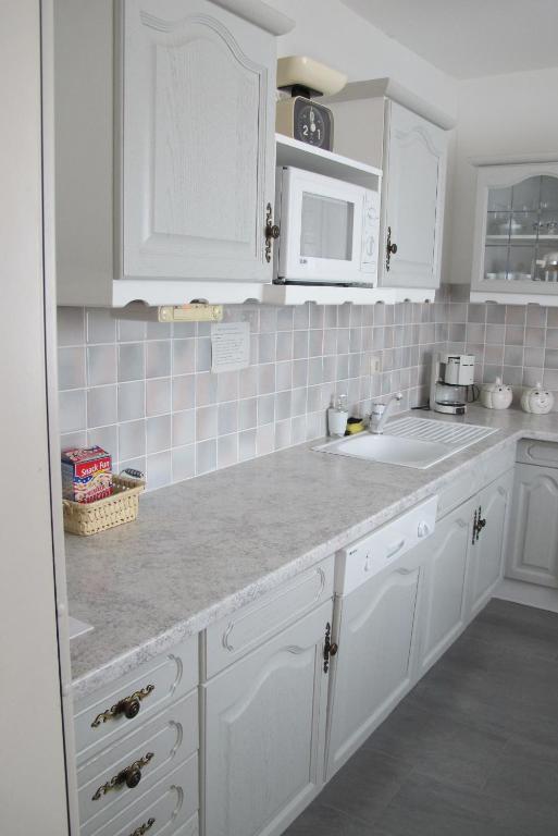 Kuchyň nebo kuchyňský kout v ubytování Gemütliche Ferienwohnung