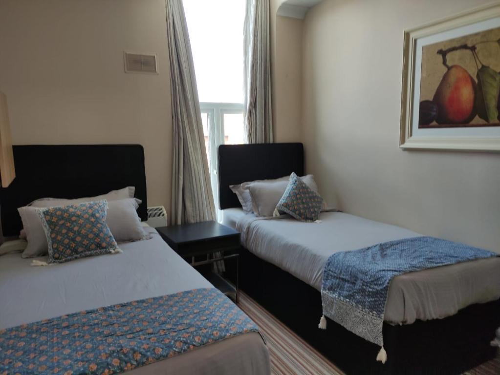 Postel nebo postele na pokoji v ubytování Double bedroom studios