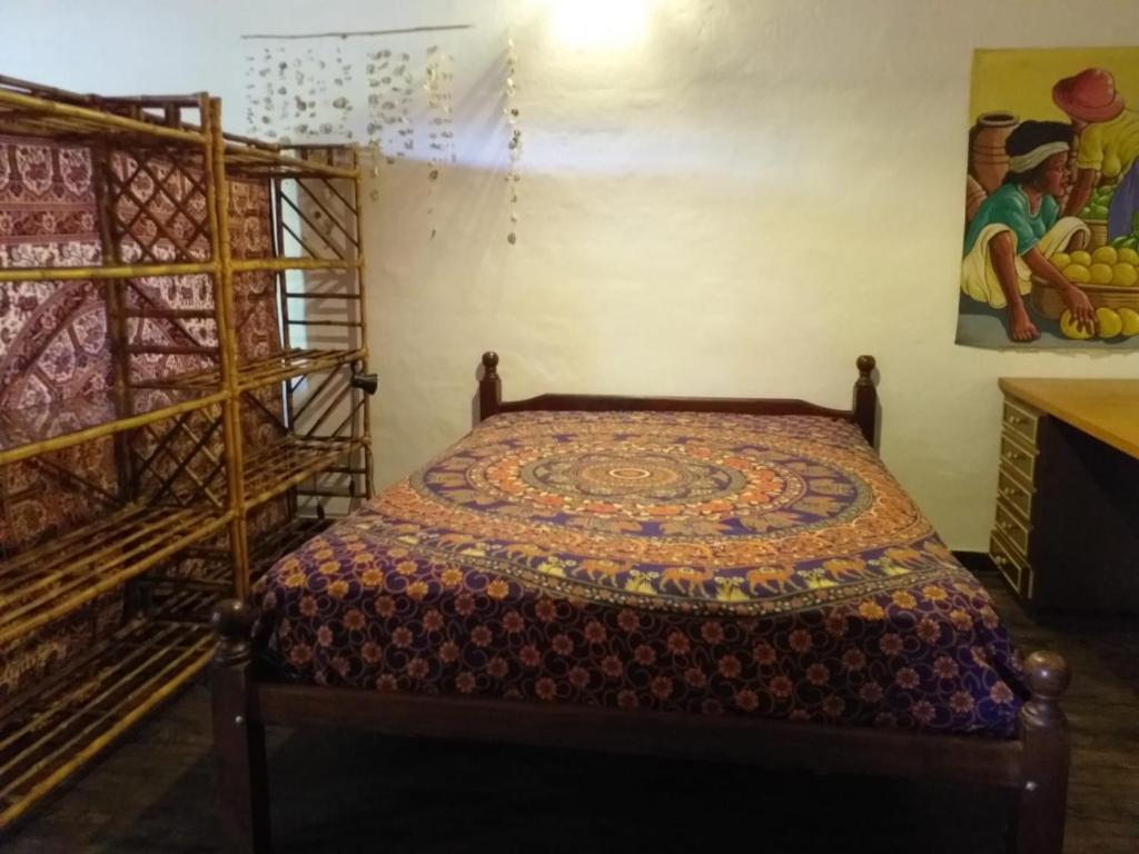 a bedroom with a bed in a room at NECOCHEA DEPARTAMENTO TIPO LOFT 4 PAX in Necochea