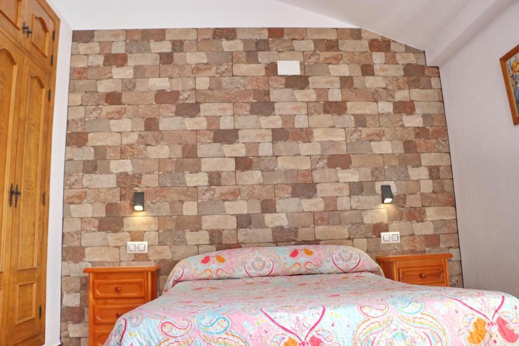 Posteľ alebo postele v izbe v ubytovaní Chalet Pradillo II