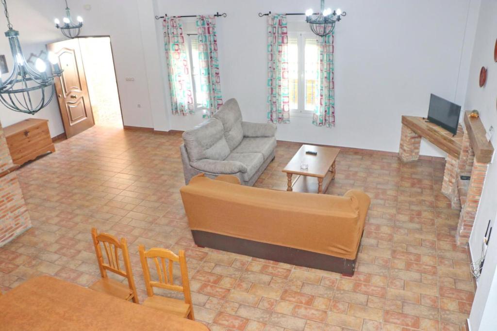Televízia a/alebo spoločenská miestnosť v ubytovaní Chalet Pradillo II