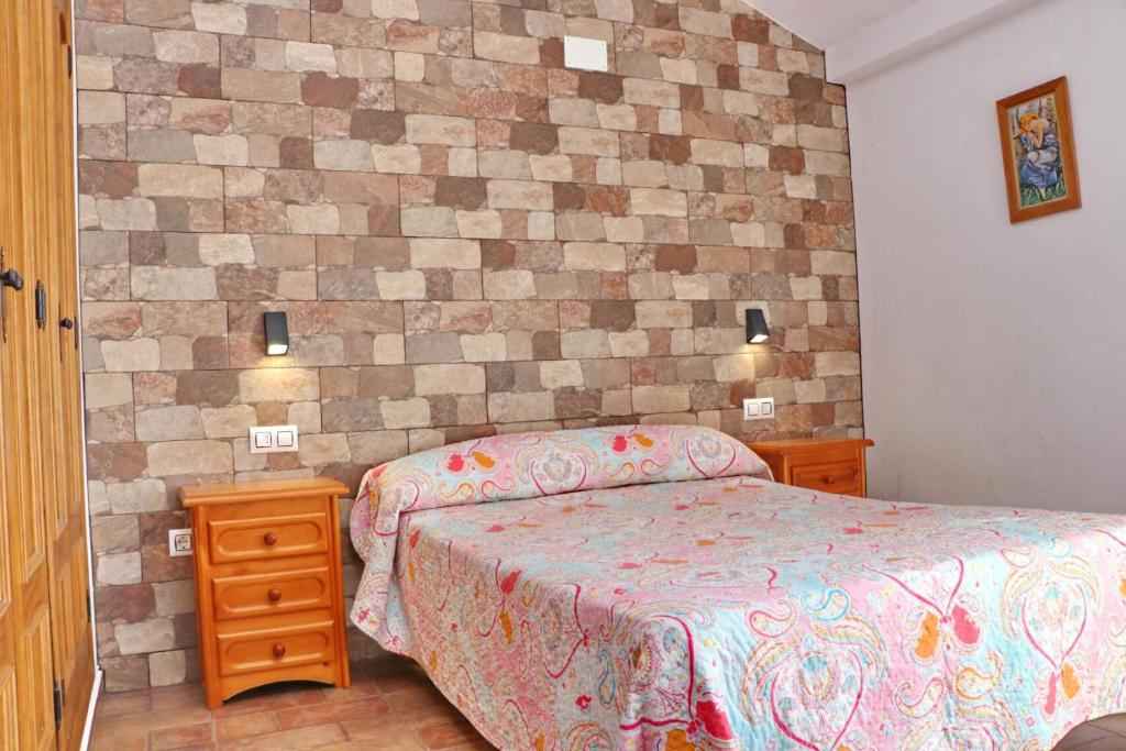 Posteľ alebo postele v izbe v ubytovaní Chalet Pradillo II