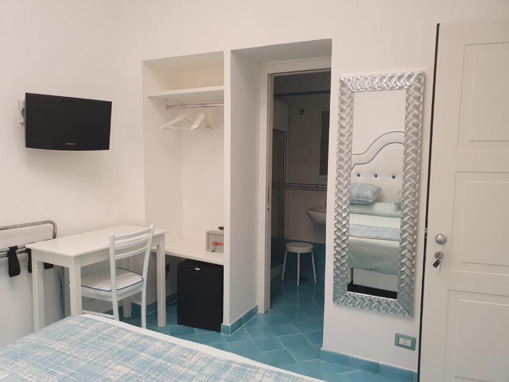Postel nebo postele na pokoji v ubytování Albergo S. Andrea