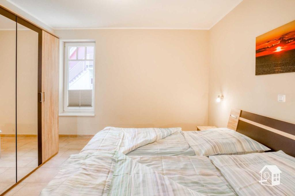 Postel nebo postele na pokoji v ubytování Appartement Sundevit