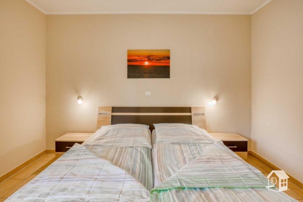 Postel nebo postele na pokoji v ubytování Appartement Sundevit