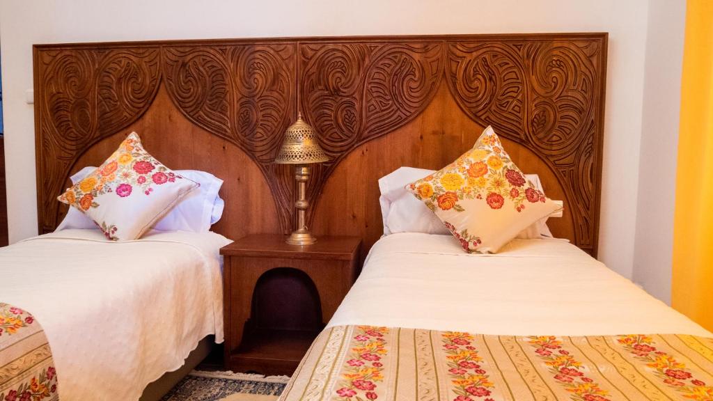 Postel nebo postele na pokoji v ubytování VILLA MATI Maison D'hôtes