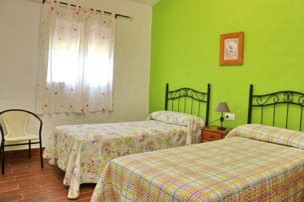 Posteľ alebo postele v izbe v ubytovaní Chalet Cortijo 31