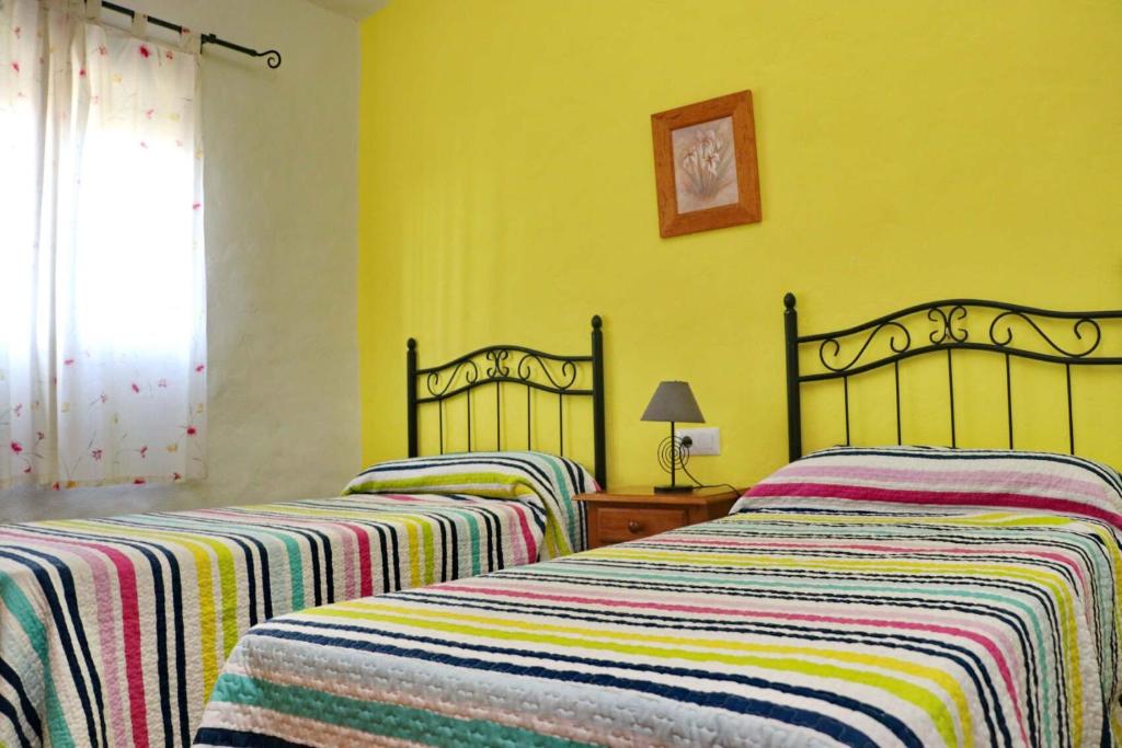 Posteľ alebo postele v izbe v ubytovaní Chalet Cortijo 31