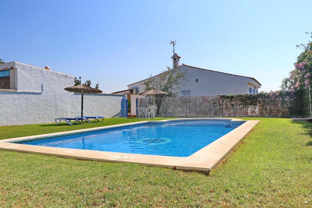 Bazén v ubytovaní Chalet Cortijo 31 alebo v jeho blízkosti