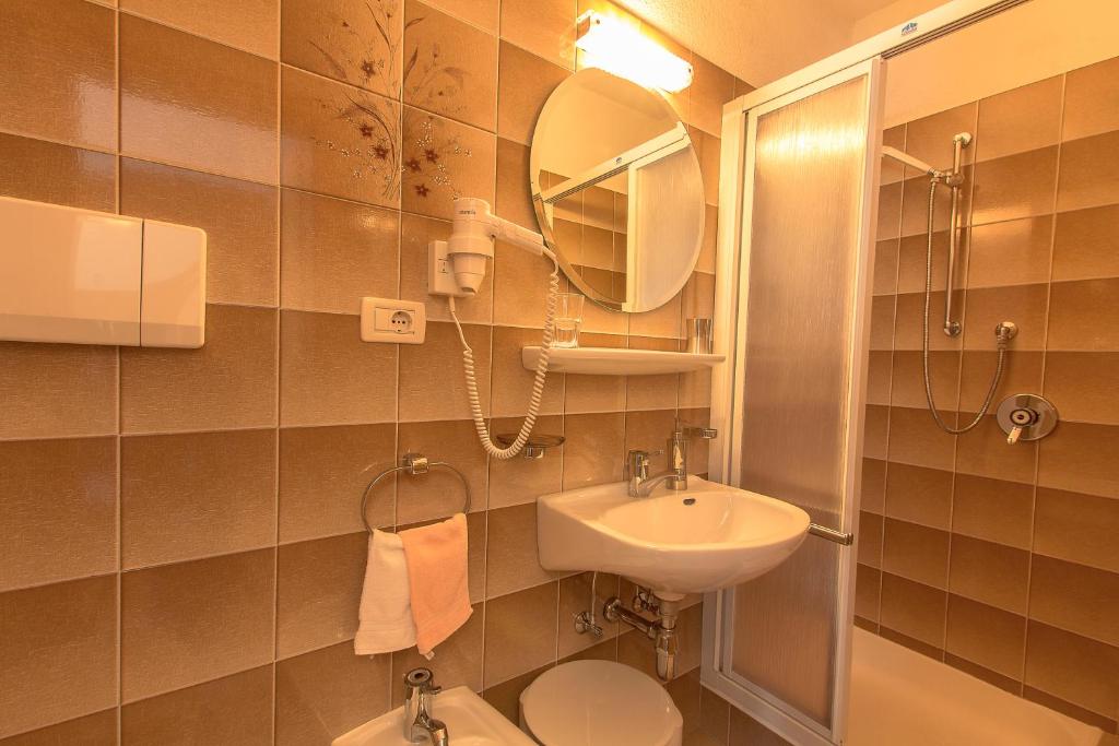 Koupelna v ubytování B&B Apartments La Palsa