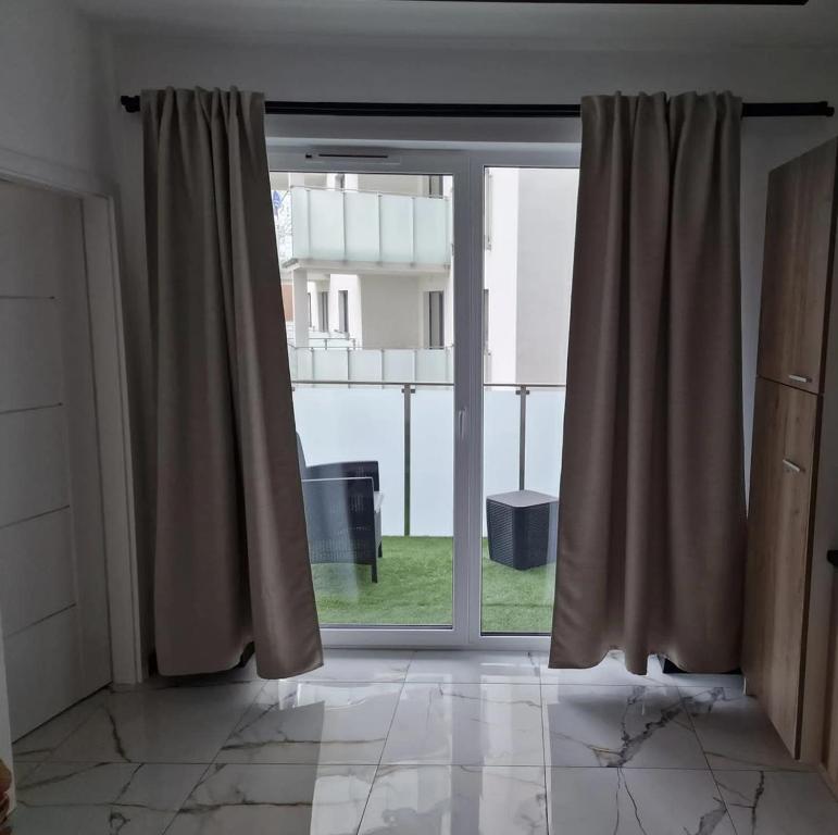 Balkón alebo terasa v ubytovaní Apartamenty nad jeziorem Białym KA-BOATS