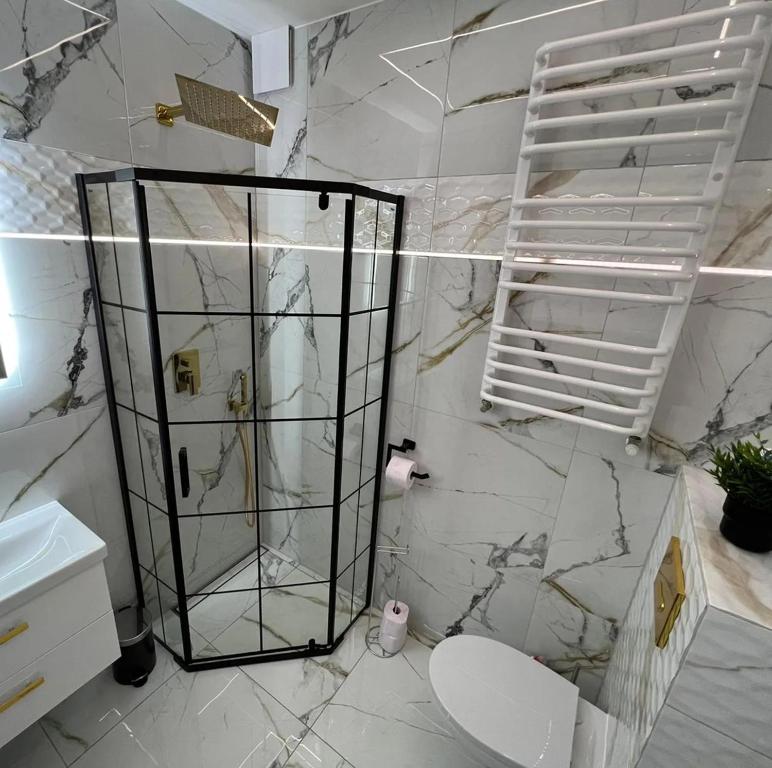 Kúpeľňa v ubytovaní Apartamenty nad jeziorem Białym KA-BOATS
