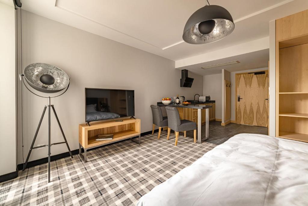 Posteľ alebo postele v izbe v ubytovaní Kazalnica Family&Conference Resort