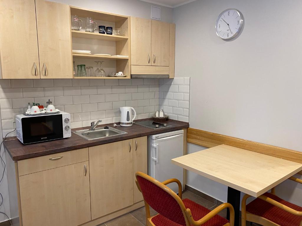Kuchnia lub aneks kuchenny w obiekcie Aurora Béta Apartman's