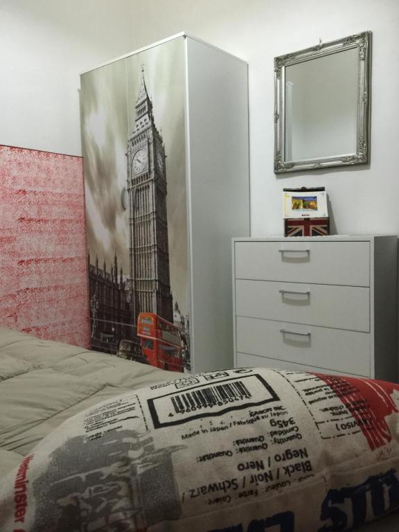 Łóżko lub łóżka w pokoju w obiekcie Il Porto