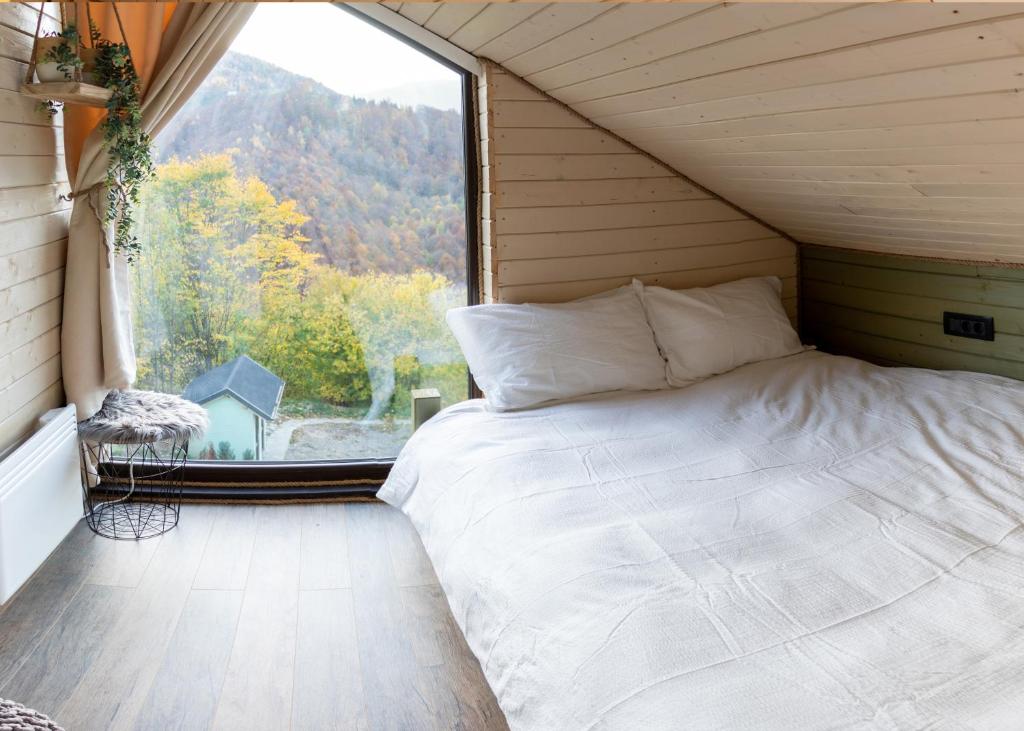 Letto o letti in una camera di Amonte Mountain Resort
