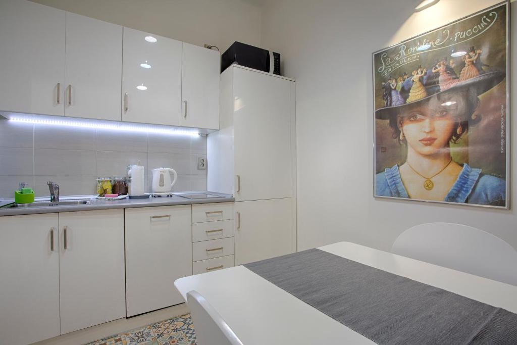 Posteľ alebo postele v izbe v ubytovaní Tyzenhauz Apartments Kazimierz