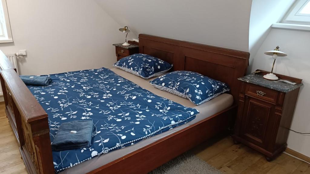 Postel nebo postele na pokoji v ubytování Apartmány stará škola