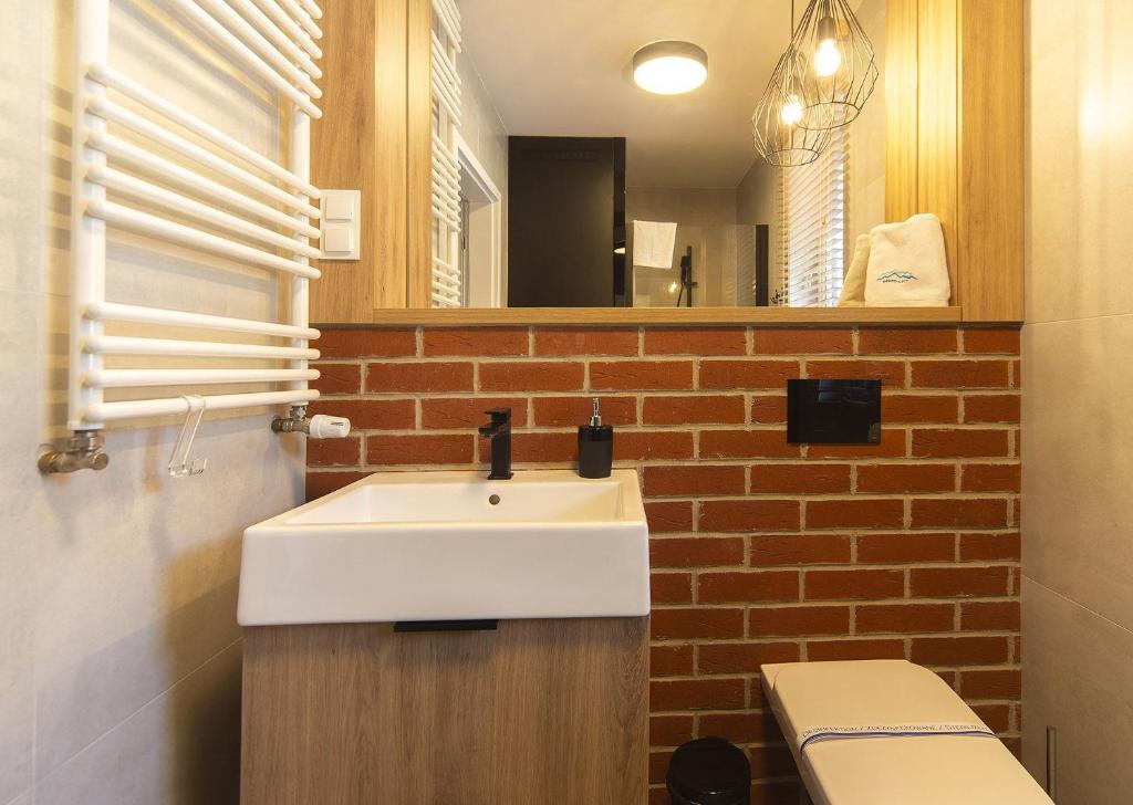Kúpeľňa v ubytovaní Apart Invest Szklarska 800 C9