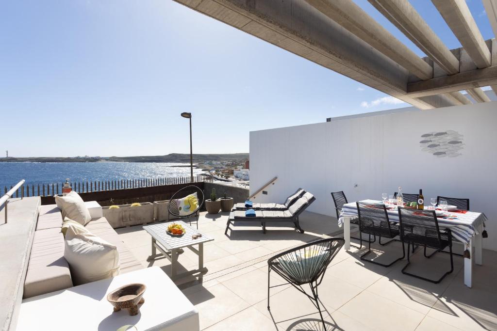 A balcony or terrace at Home2Book Design & Breathtaking Sea Views El Porís