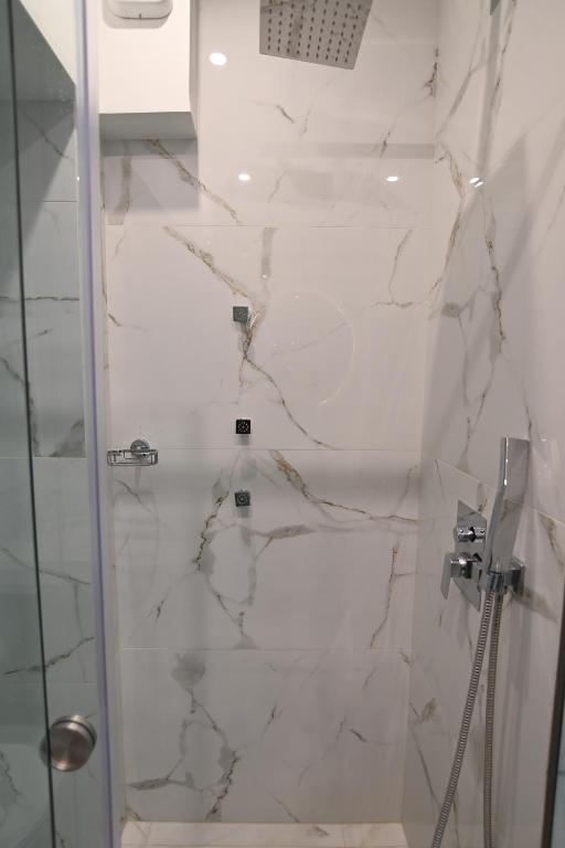 Koupelna v ubytování Rihios Hotel