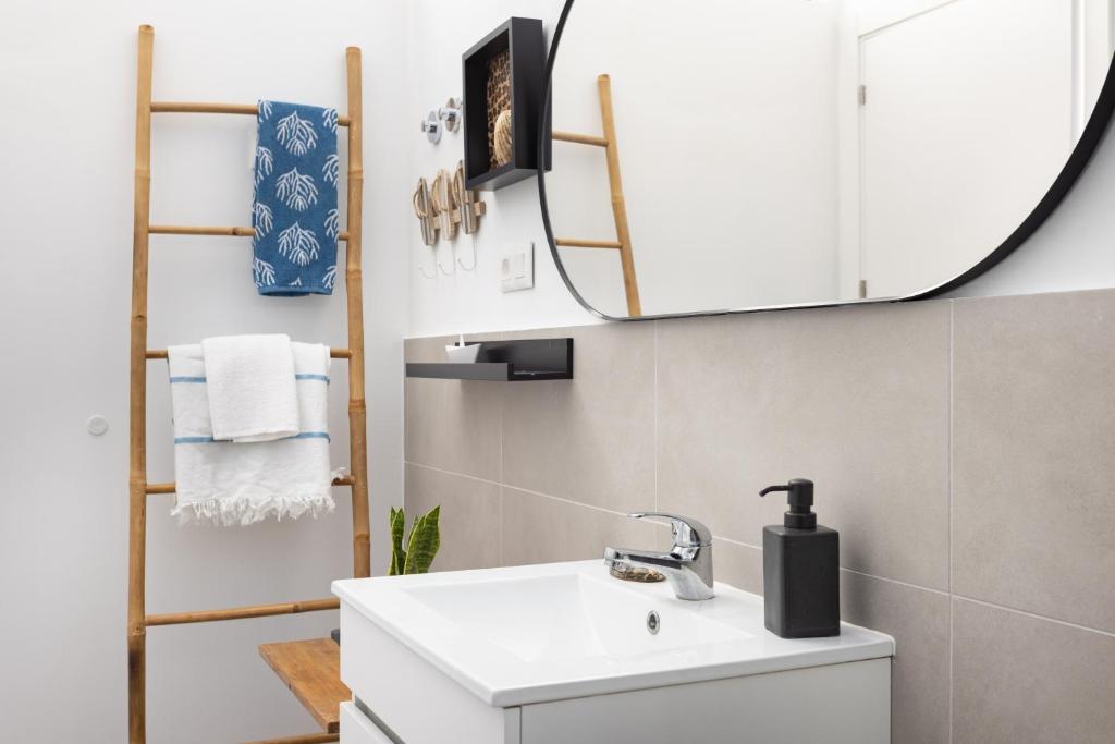 A bathroom at Home2Book Design & Breathtaking Sea Views El Porís