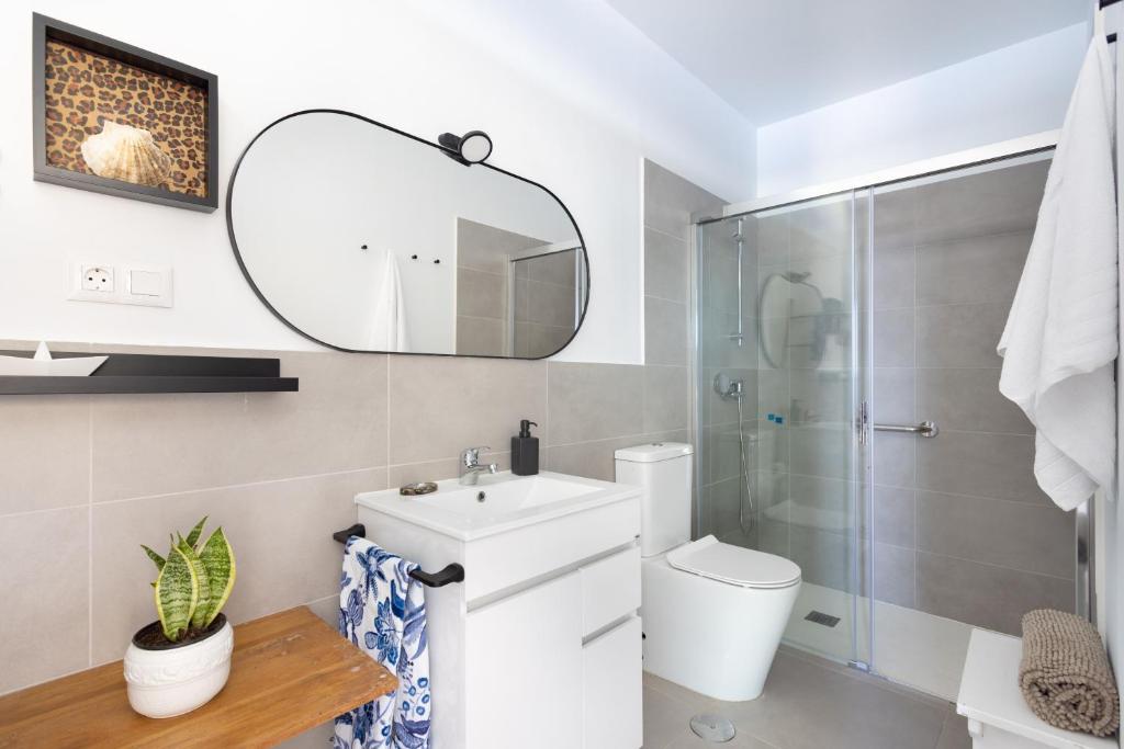 A bathroom at Home2Book Design & Breathtaking Sea Views El Porís