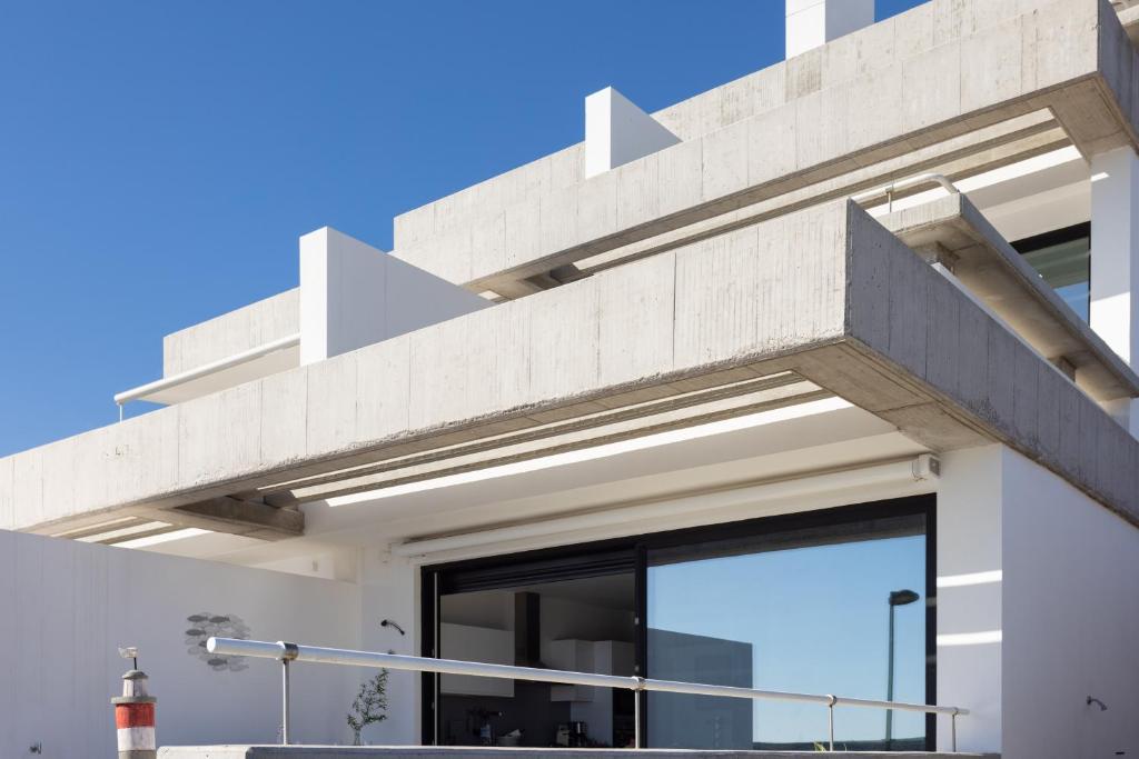 A balcony or terrace at Home2Book Design & Breathtaking Sea Views El Porís