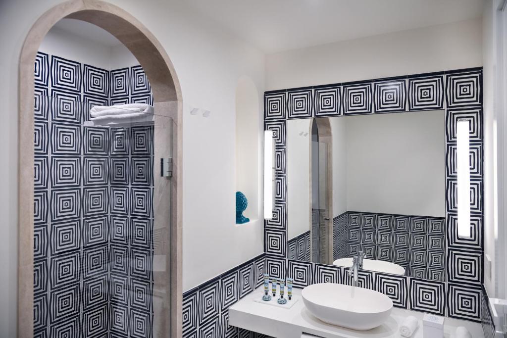 Koupelna v ubytování Pazziella Garden & Suites
