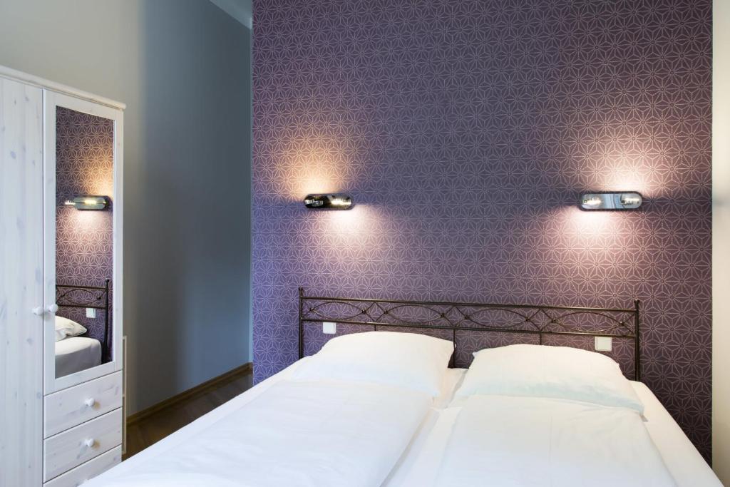 Postel nebo postele na pokoji v ubytování Hotel Residenz Begaswinkel