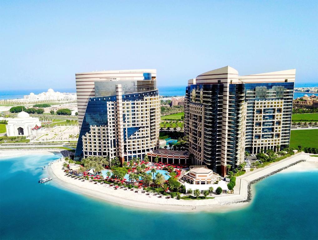 an aerial view of a resort on a island in the water at Khalidiya Palace Rayhaan by Rotana, Abu Dhabi in Abu Dhabi