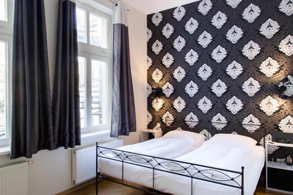 Postel nebo postele na pokoji v ubytování Hotel Residenz Begaswinkel