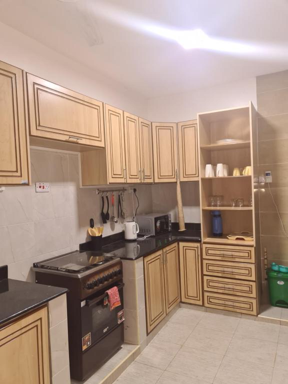 Kuchyň nebo kuchyňský kout v ubytování Karibuni palace mtwapa