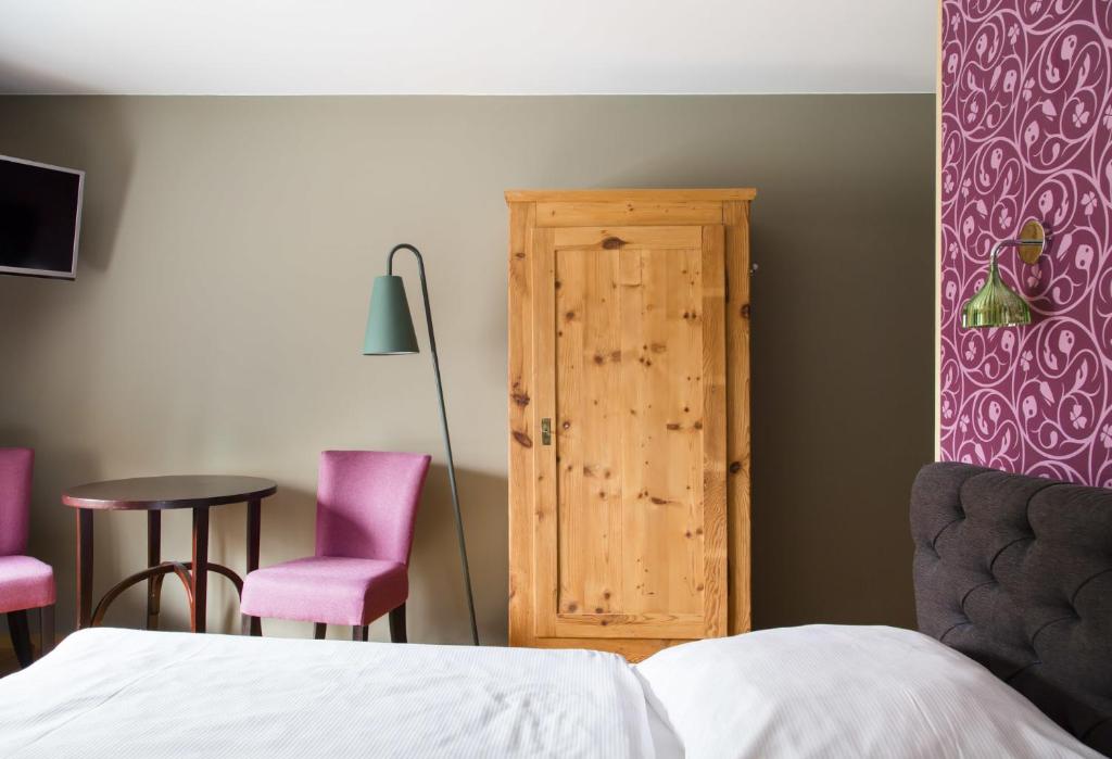 Postel nebo postele na pokoji v ubytování Hotel Residenz Begaswinkel