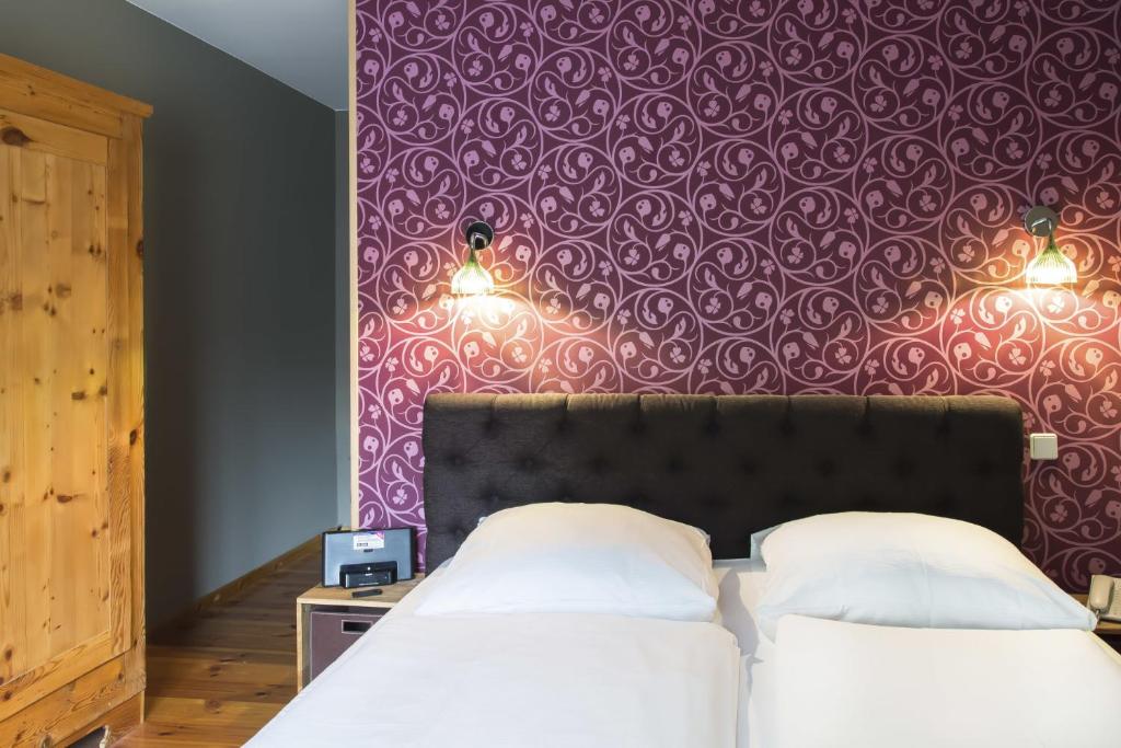 Postel nebo postele na pokoji v ubytování Hotel Residenz Begaswinkel