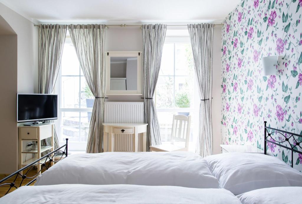 Postel nebo postele na pokoji v ubytování Hotel Residenz Begaswinkel
