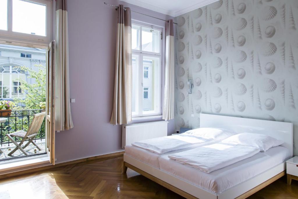 Postel nebo postele na pokoji v ubytování Hotel Residenz Begaswinkel