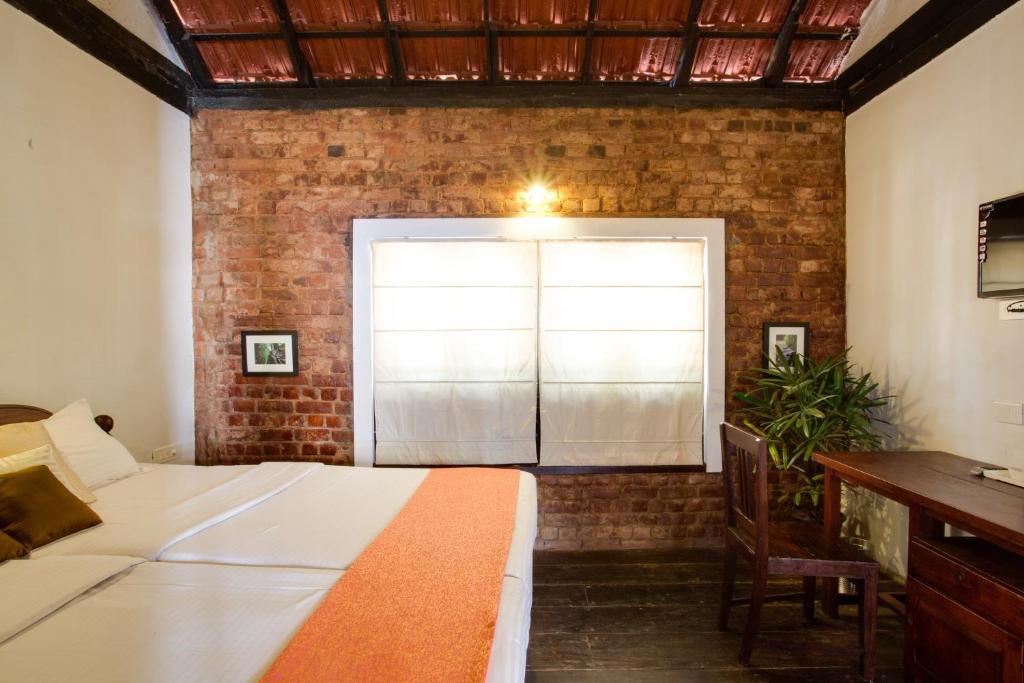 Postel nebo postele na pokoji v ubytování Niyati - Boutique Stay