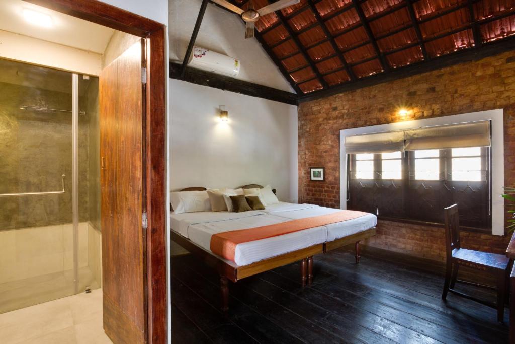 Postel nebo postele na pokoji v ubytování Niyati - Boutique Stay